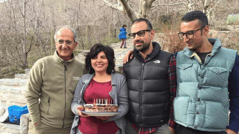 Let grieving wife of dead environmentalist leave Iran, son pleads