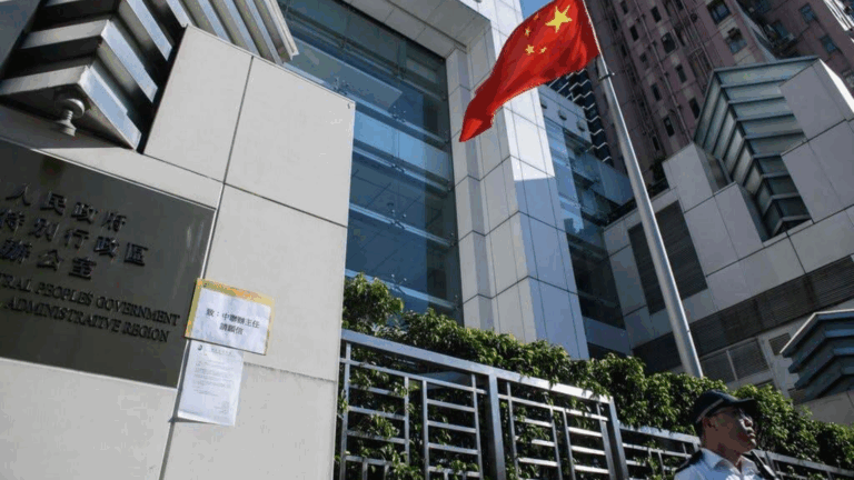 -Hong Kong Journalist Is Roughed Up and Detained by Police in Beijing