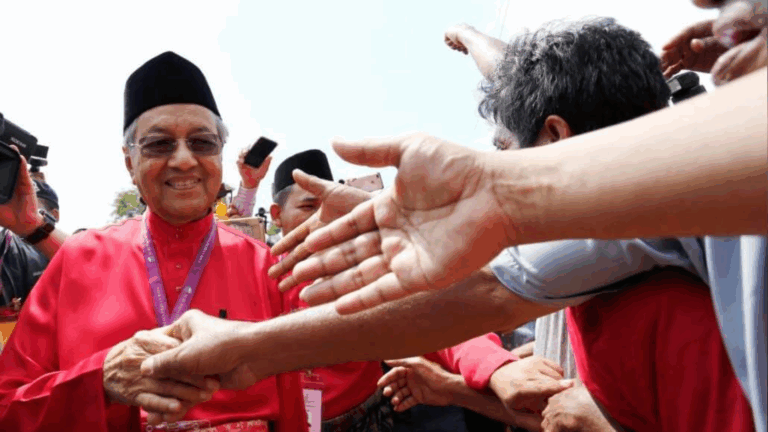 Malaysia's opposition leader Mahathir under investigation for 'fake news'