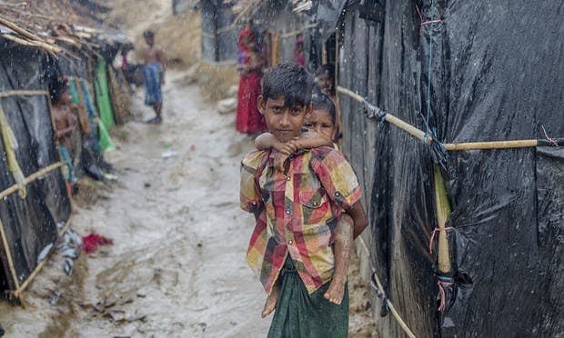Rohingya children left stranded amid garbage and muck in Myanmar
