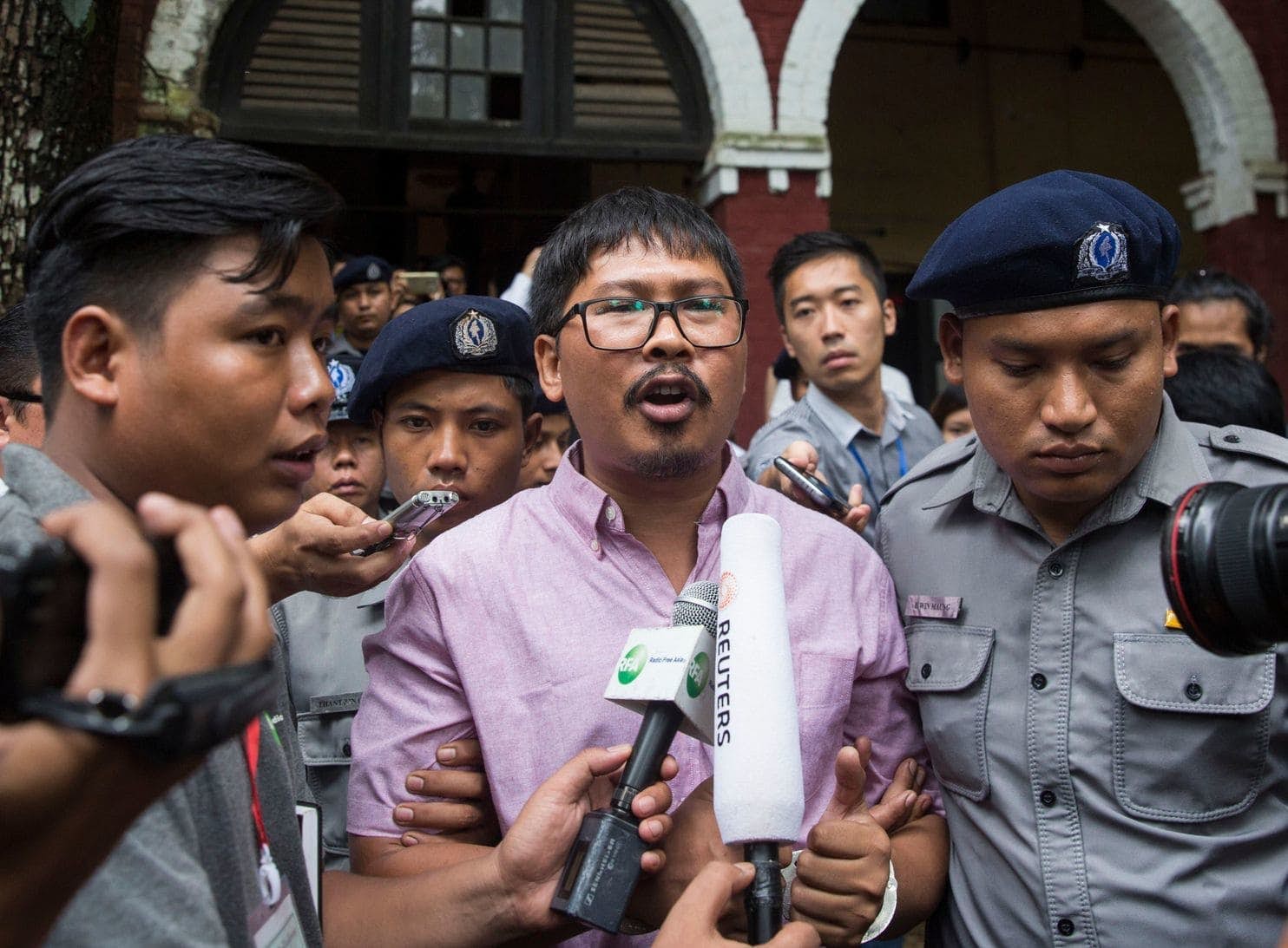 Myanmar judge charges two Reuters journalists with violating secrets act