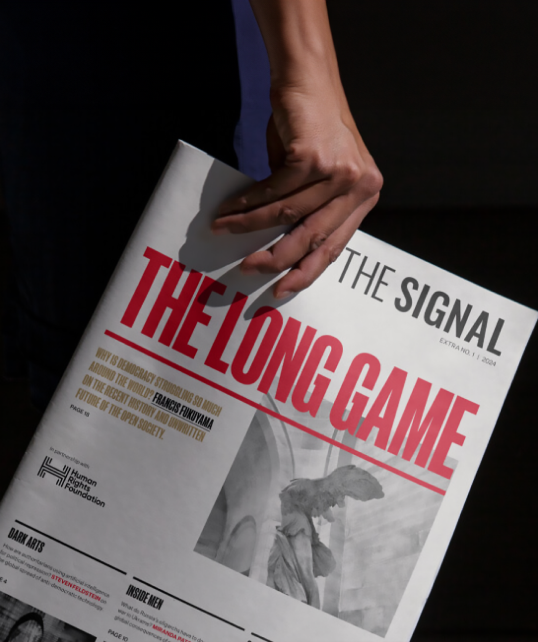 HRF x The Signal "The Long Game" newspaper with black background