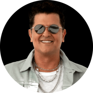 Grammy-winning singer, composer, and author from Colombia Carlos Vives headshot with black background