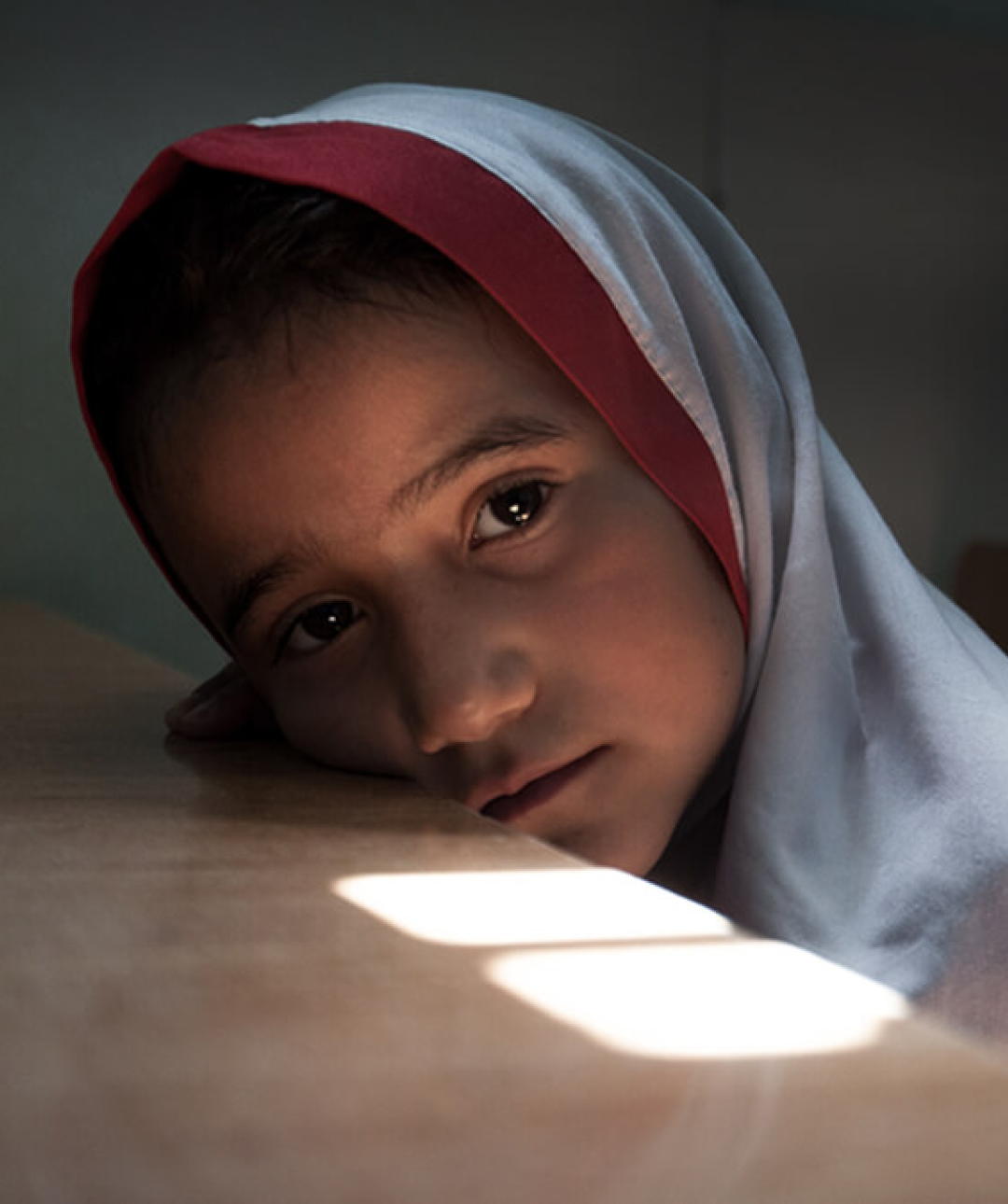 Young Afghan girl inside a classroom