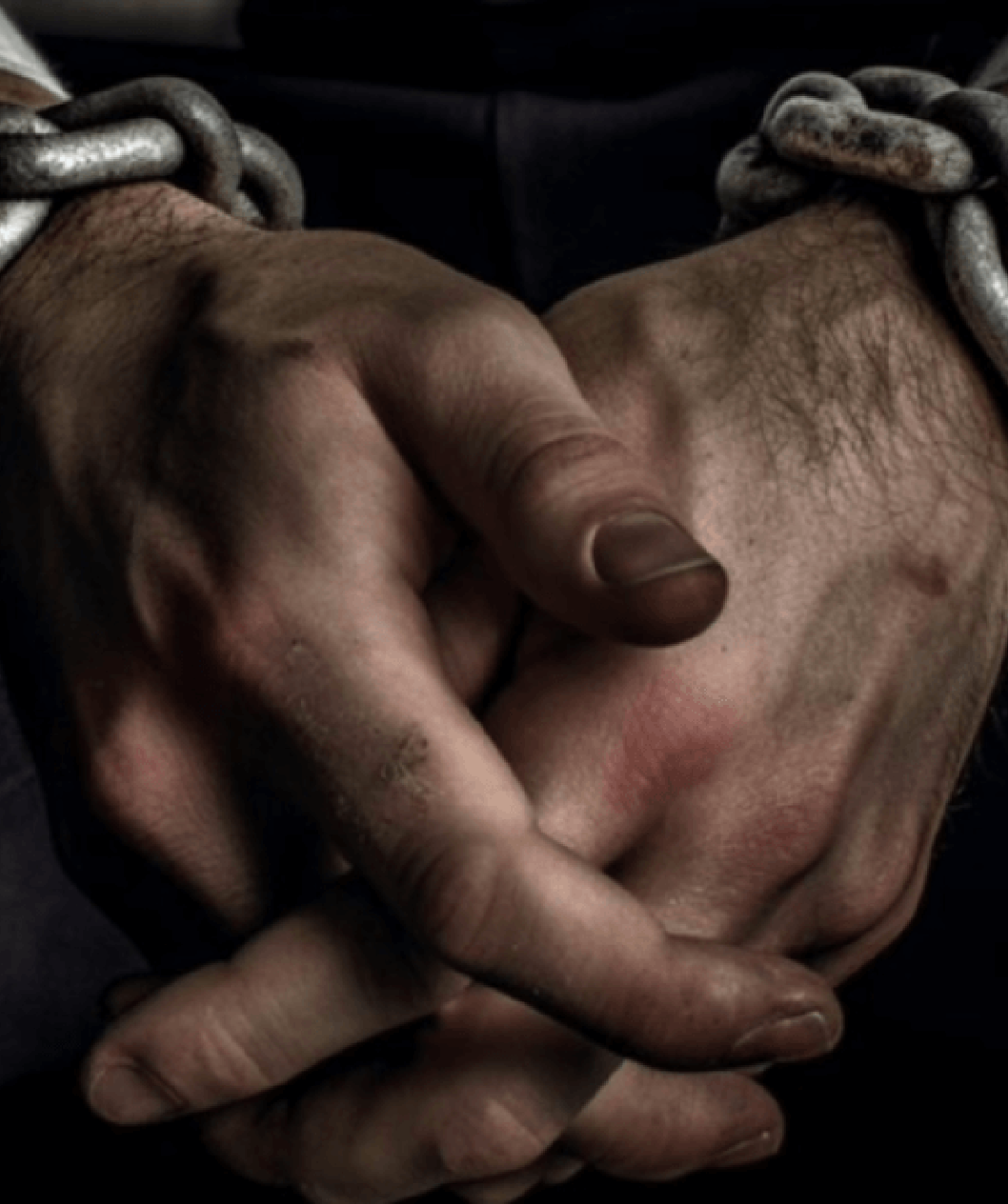 Taken blog post header showing chained up hands