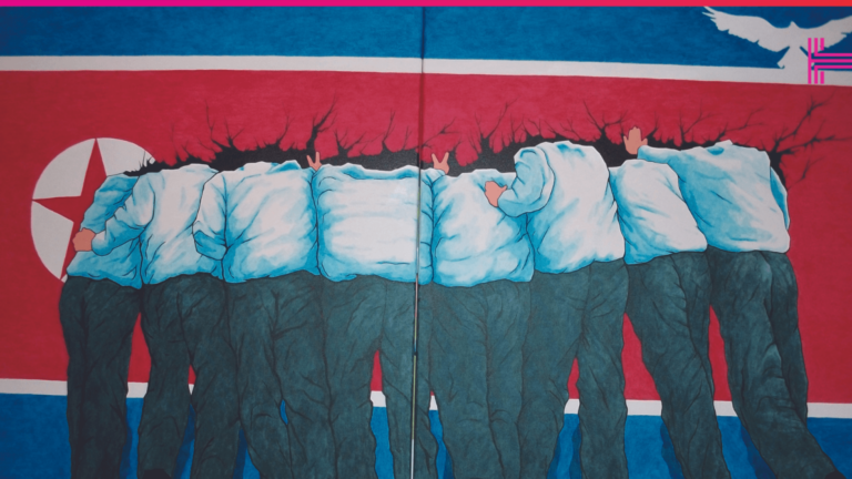 Header showing North Korean students heads being covered by the North Korean flag