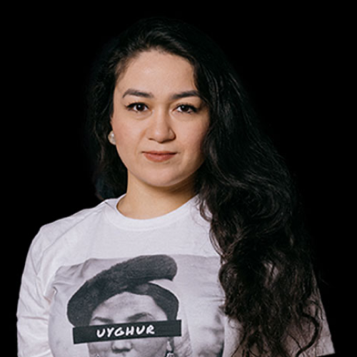 Jewher Ilham headshot with black background