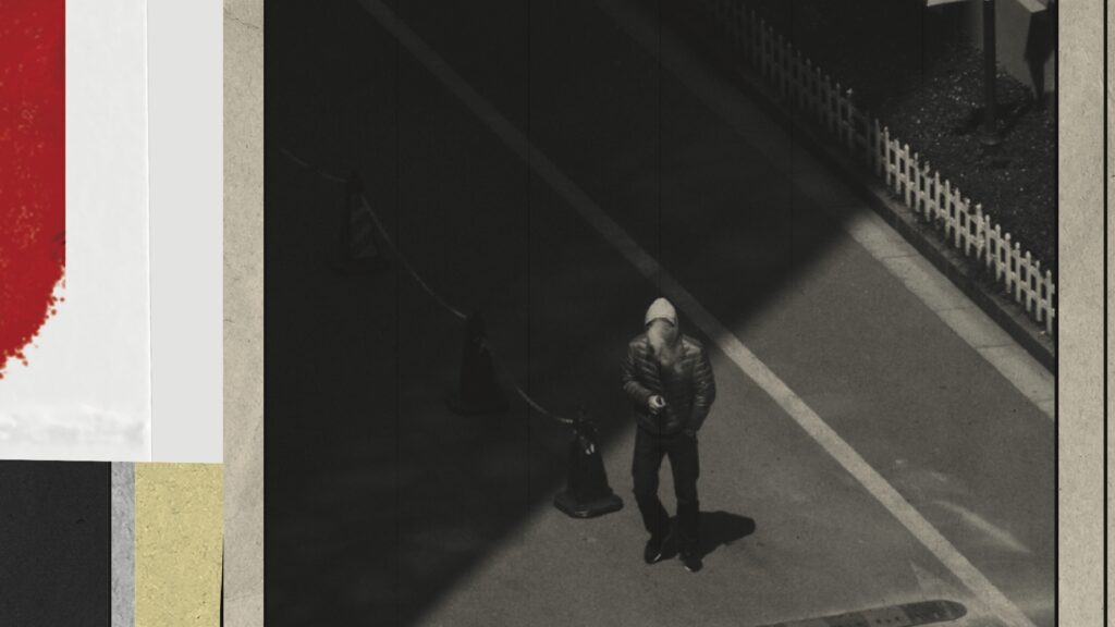 Surveillance camera of person in black and white no face shown