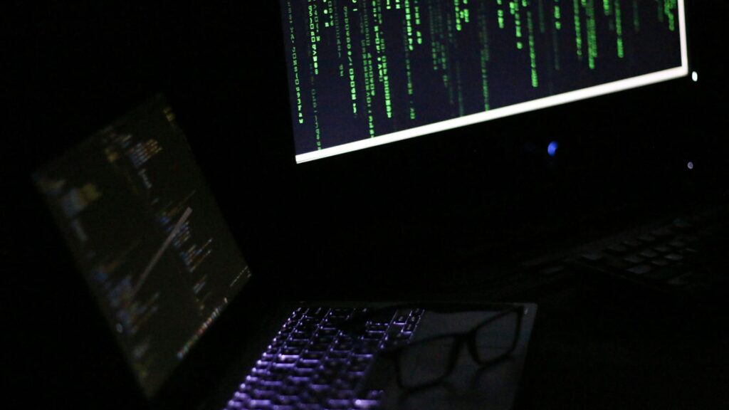 Typing, hacking and computer system in ominous black light
