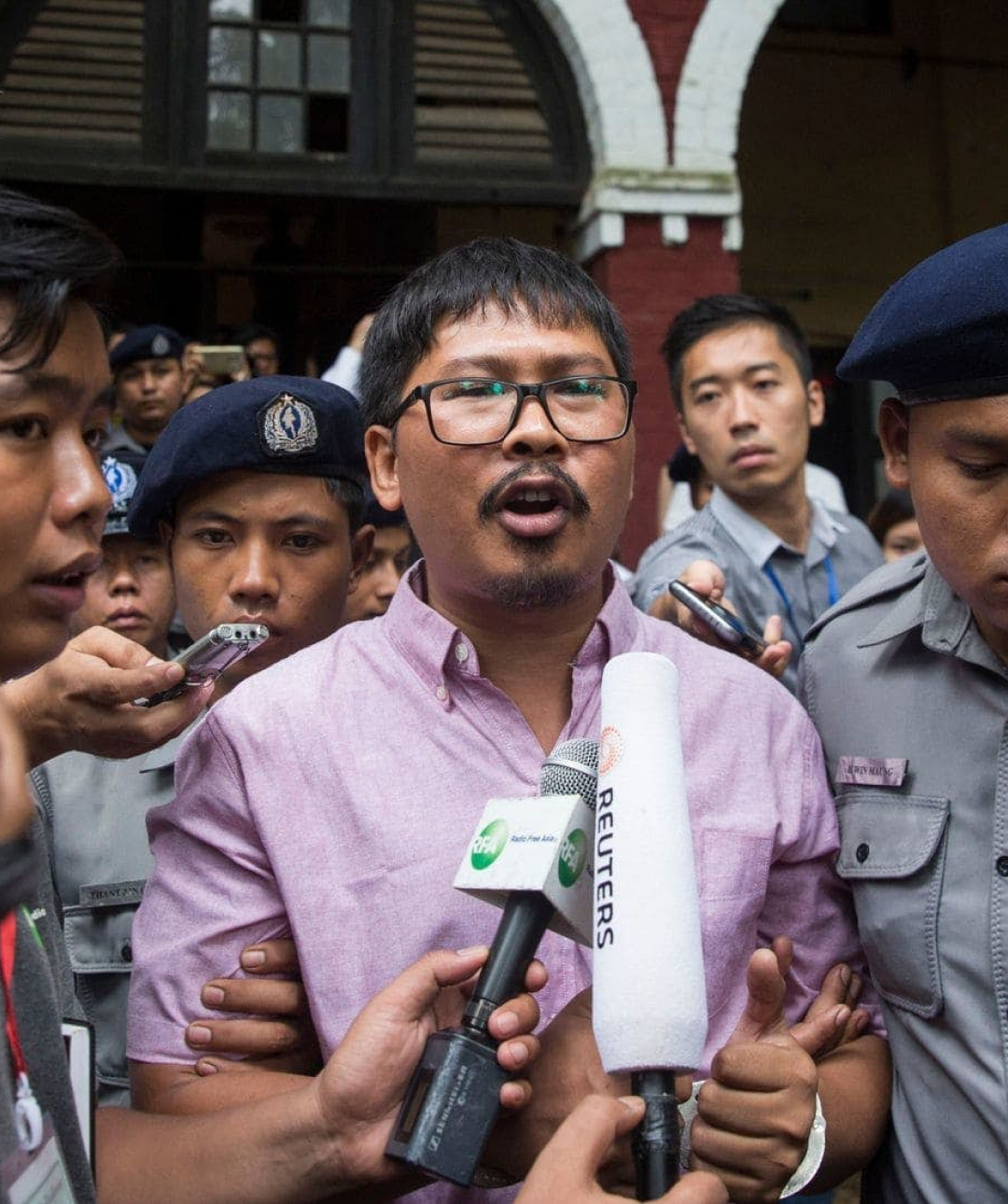 Myanmar judge charges two Reuters journalists with violating secrets act