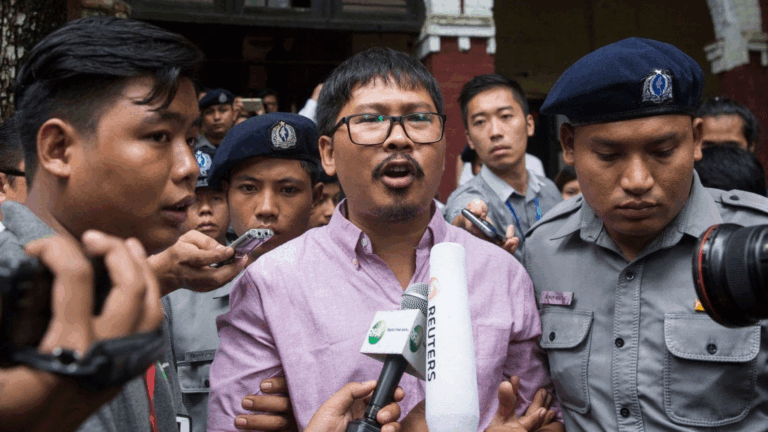 Myanmar judge charges two Reuters journalists with violating secrets act