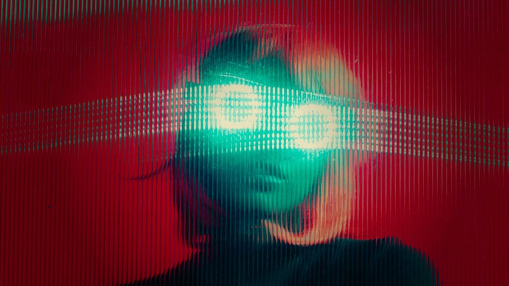 Girl behind glass tint with Futuristic shades and colors