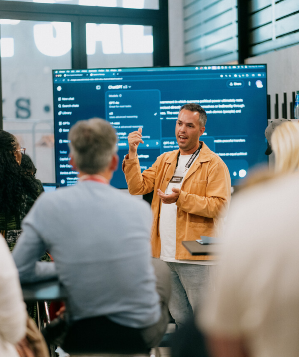 Justin Moon leads a workshop on AI at the 2025 Oslo Freedom