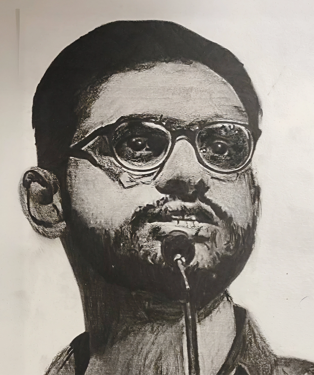 A black-and-white pen drawing of Umar Khalid