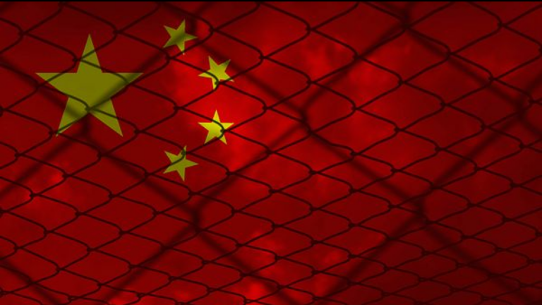 A 7-Year-Old American Boy Is Trapped in China Because His Father Made Art
